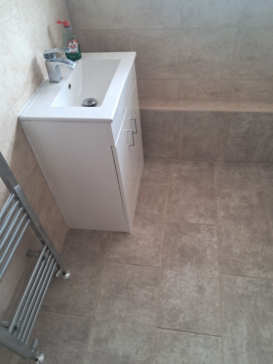 Finished bathroom with vanity, after