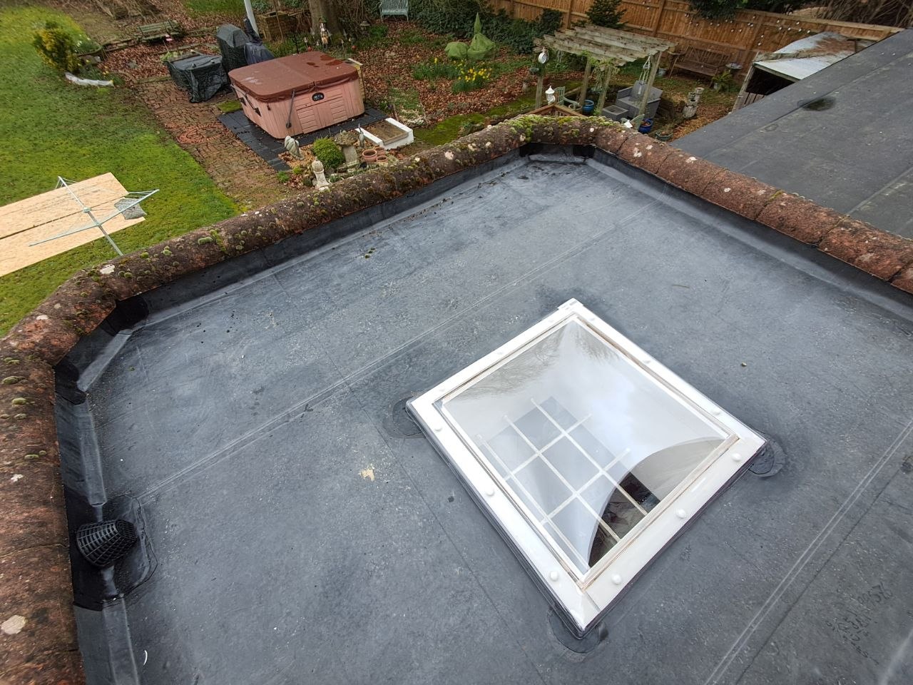 Finished flat roof with skylight, after
