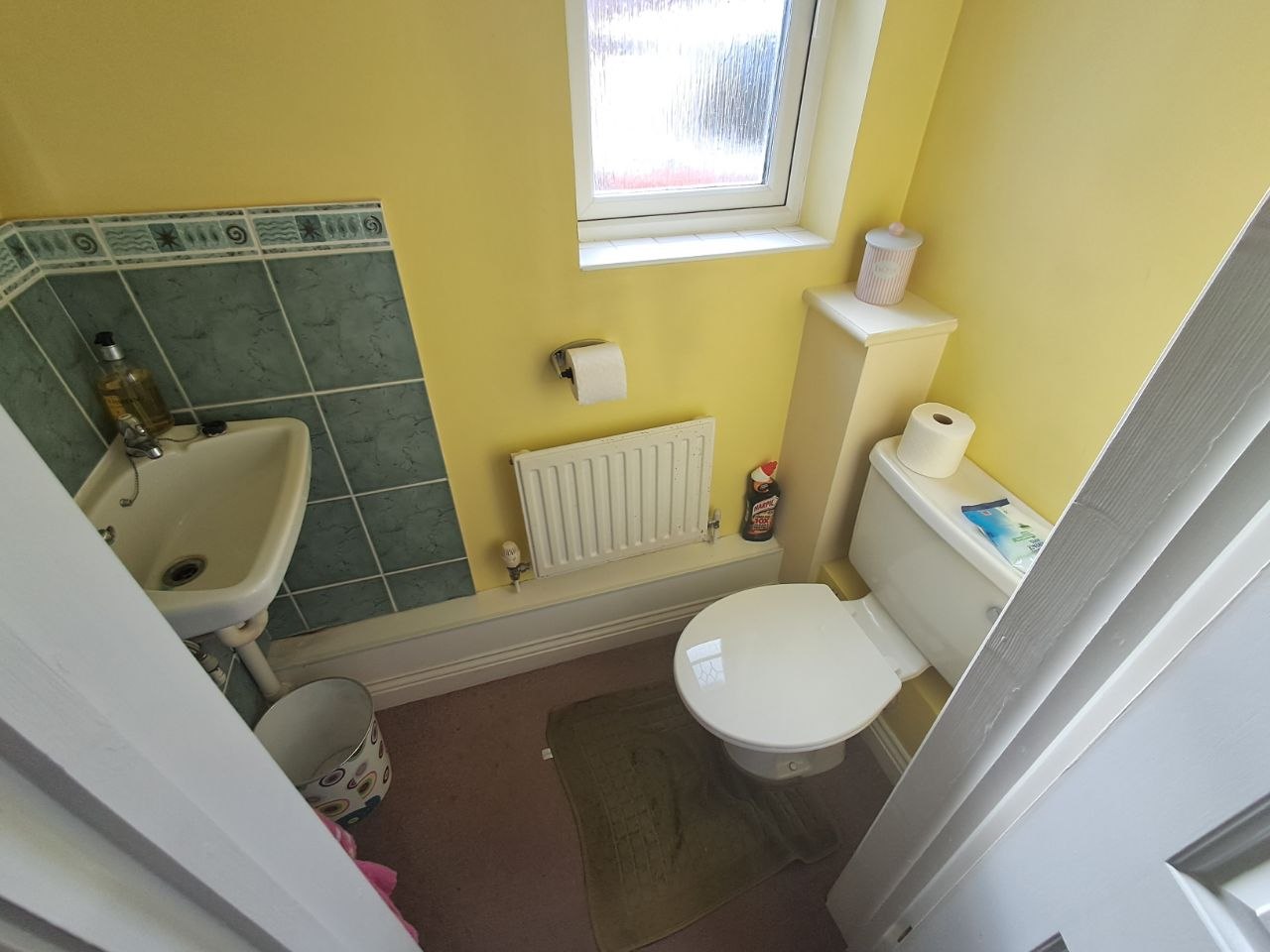 Dated downstairs WC, before renovation